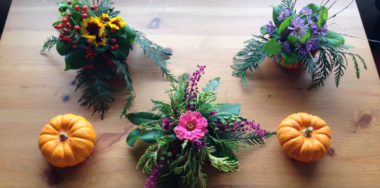 Decorative pumpkin and flower centrepieces.